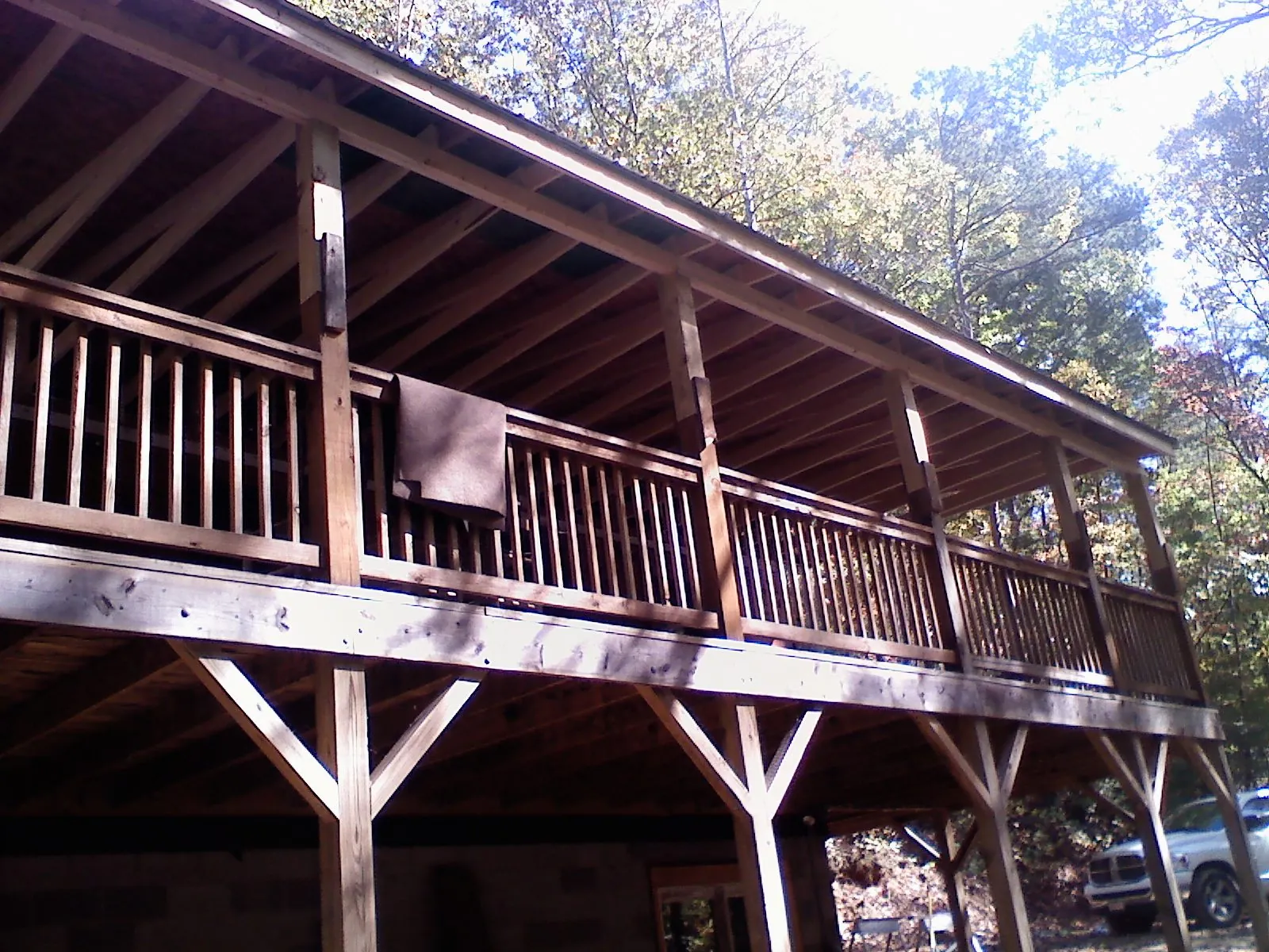 Timber framing under a new elevated porch and deck — Roof Leak Repair in Woods Cross by Roofing Brothers